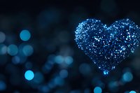 Glowing blue heart shape made of sparkles and glitter particles on dark background with bokeh lights, romantic Valentine's day concept for greeting cards.