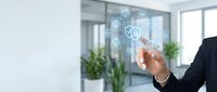 Business professional interacting with digital healthcare technology interface displaying medical icons and data analytics in modern office environment.