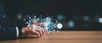 Businessman hands with digital network connections and glowing data points representing modern technology, connectivity and business innovation concepts.