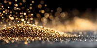 Luxurious gold glitter particles with bokeh effect on dark background, creating elegant festive atmosphere for luxury design projects.