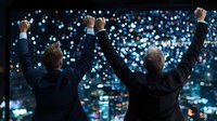 Rear view of two businessmen celebrating success with raised arms against night city lights bokeh background, achievement concept.