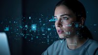 Young woman using facial recognition technology with digital interface overlay and futuristic holographic elements in modern workspace environment.
