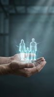 Cupped hands holding glowing holographic family silhouettes with light effects representing protection, care and insurance coverage concepts.