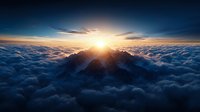 Majestic sunrise over mountain peak piercing through dense cloud cover with dramatic sunburst and deep blue sky creating ethereal atmospheric landscape.