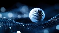 Golf ball resting on textured fabric surface with blue bokeh lights creating elegant sports equipment composition for luxury athletic branding materials.