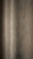 Soft taupe fabric with subtle vertical fold creating light and shadow play, suitable for interior design, textile backgrounds, and upholstery projects.