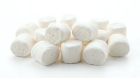 Soft white marshmallows isolated on white background, ready for design use in food packaging, confectionery advertising, and culinary projects.