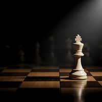 White chess king piece standing alone on wooden chessboard with dramatic lighting and dark background for strategic business concepts.