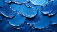 Abstract blue oil paint texture with thick impasto brushstrokes creating dynamic waves and ridges for artistic backgrounds and creative projects.