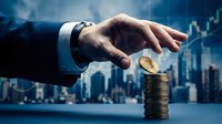Businessman hand placing golden coin on stack with financial growth chart and city skyline background representing investment success and wealth building.