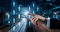 Businessman hand touching digital hexagonal network with human resources icons over blurred city lights background for HR management technology solutions.