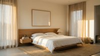 Spacious bedroom with wooden platform bed, neutral bedding, natural light from sheer curtains, and minimalist decor for residential or hospitality design projects.