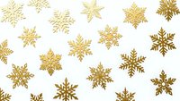 Golden snowflakes scattered on white background for winter holiday decorations, Christmas crafts, seasonal greeting cards and festive design projects.