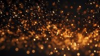 Magical golden bokeh lights scattered against dark background create dreamy atmospheric effect with glowing particles and blurred sparkles floating in space.