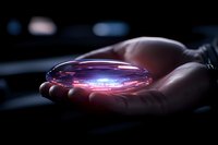 Glowing magical crystal sphere floating above palm in dark environment, emitting ethereal blue and purple light. Mystical energy concept for spiritual designs.