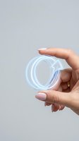 Cropped hand holding glowing neon arrow symbol pointing right, isolated on neutral background. Suitable for business growth, digital marketing, and technology concepts.