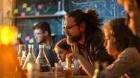 Diverse group of scientists conducting research in laboratory with glassware and equipment during evening hours, warm lighting creates atmospheric mood.