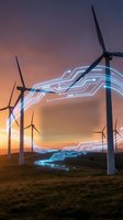 Wind turbines with glowing digital circuit patterns at sunset representing renewable energy technology and smart grid innovation for sustainable power generation.