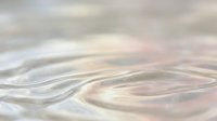 Soft flowing abstract waves in pastel colors creating dreamy ethereal background with gentle curves and smooth gradients for relaxation and wellness content.