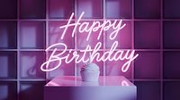 Happy Birthday glowing neon sign in pink and purple tones with a cupcake on a pedestal, festive celebration background for party decor.