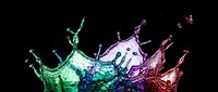 Colorful liquid splash crown with green, blue, purple and red droplets frozen in motion, isolated on transparent background. Ready for t-shirt designs, stickers, clipart and print-on-demand products.