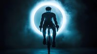 Cyclist riding bike silhouetted against glowing blue circular light, wearing helmet and athletic gear. Dramatic neon glow effect for sports, fitness, and energy concepts.
