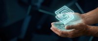 Businessman hands holding glowing digital maze symbol representing problem solving and strategic thinking in corporate environment for business concepts.