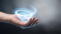 Caucasian hand holding glowing blue spiral energy vortex, representing innovation, technology, and digital transformation for business and science concepts.
