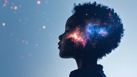 Young African American woman silhouette with galaxy and stars overlaid in her afro hair against blue background, representing dreams, imagination and cosmic connection.
