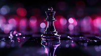 Chess queen piece on dark reflective surface with pink and purple bokeh lights creating magical atmosphere, dramatic lighting enhances strategic game concept.