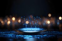 Futuristic glowing blue hologram platform with rising light particles against dark background with bokeh lights creates magical sci-fi atmosphere.