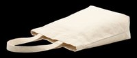 Beige canvas tote bag with handles, isolated on transparent background. Ready for t-shirt design, clipart, stickers, print-on-demand products, and sublimation projects.