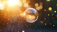 Magical soap bubble floating in dark space with golden glowing sparkles and bokeh lights creating dreamy atmospheric effect against black background.