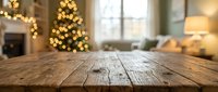 Empty wooden table surface with blurred Christmas tree lights and cozy living room background for holiday product display and seasonal marketing.