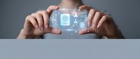 Male hands holding smartphone displaying digital security interface with globe and network icons on gray background.