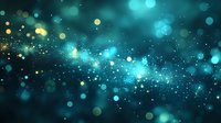 Magical turquoise and gold bokeh lights scattered across dark background create dreamy celestial atmosphere with glowing particles and sparkles floating in space.