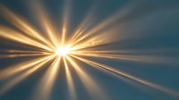 Bright golden light rays bursting from central point against dark teal background, creating dramatic sunburst effect with soft glowing beams radiating outward.