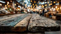 Rustic wooden table surface with warm bokeh lights creating cozy restaurant atmosphere for product display and food photography backgrounds.