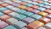 Colorful square tiles in pastel pink, mint, yellow and white arranged in geometric pattern create soft modern mosaic background with selective focus effect.