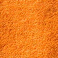 Vibrant orange textured background with rough surface pattern creates dynamic visual interest. Seamless design for creative projects and digital art applications.