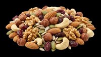 Mixed nuts and dried fruits pile isolated on transparent background, ready for t-shirt design, clipart, stickers, print on demand, and sublimation projects.