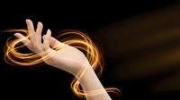 Hand reaching through glowing golden energy swirls on dark background for magical fantasy design concepts.