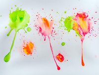 Vibrant watercolor paint splatters in neon green, pink and orange with drips and splashes on white background, creating dynamic abstract art composition.
