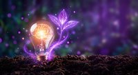 Glowing light bulb with purple plant sprouting from soil against magical bokeh background symbolizing innovation, creativity and sustainable energy solutions.