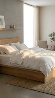 Serene bedroom interior with wooden bed frame, white linens, gray accent wall, natural light from large window, and minimalist decor.