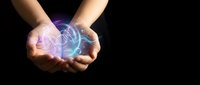 Hands holding glowing holographic brain with neural networks on black background for technology and artificial intelligence concepts.