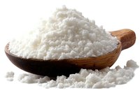 Coarse sea salt crystals in wooden spoon on white background, scattered salt grains around. Natural organic cooking ingredient for food preparation.