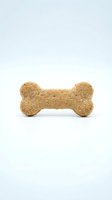 Cork dog bone toy isolated on white background, pet chew toy for training and play.
