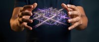 Hands holding glowing purple digital wireframe structure, representing technology, innovation, and data network concepts for business and digital transformation projects.