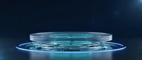 Futuristic holographic platform with glowing blue energy rings and transparent glass surface for product display and technology presentations.